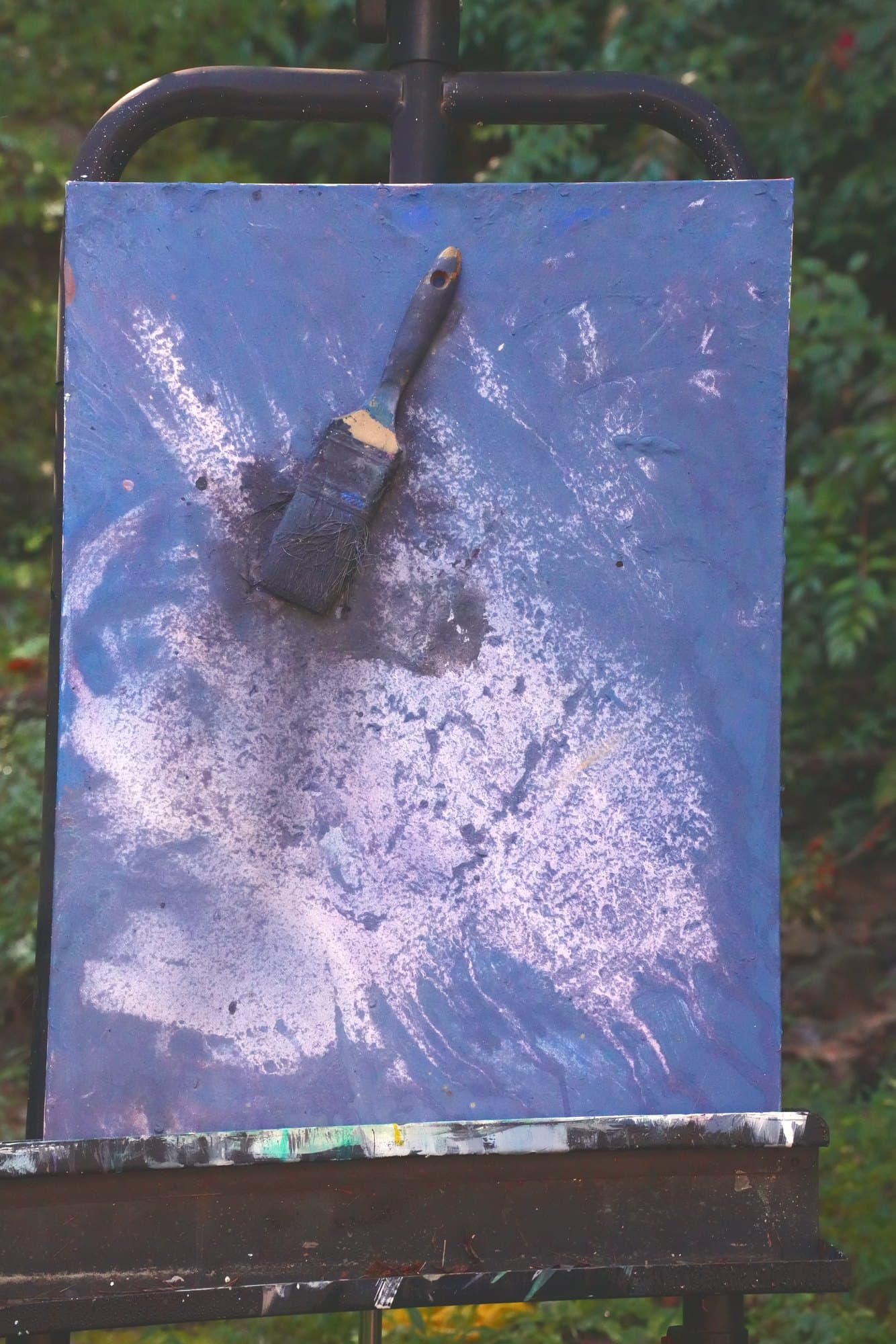 "No. F002" by Limsley, LIM-2026-002, one-of-one original abstract painting, 18 x 24 in., photographed on the easel outdoors